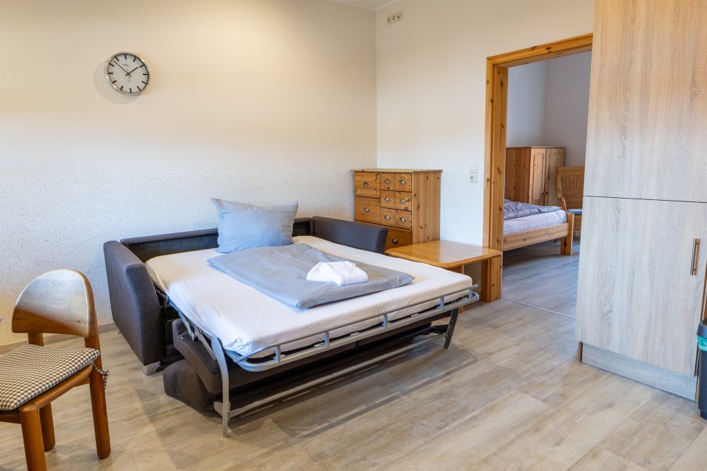 Gänsedistel Innenansicht des Wohnzimmers in der Ferienwohnung Gänsedistel auf dem Bauernhof Diestel im Landkreis Celle.
